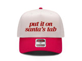 Put It on Santa's Tab embroidered snapback hat, natural front with red brim and red lettering