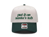 Put It on Santa's Tab embroidered snapback hat, natural front with green brim and green lettering